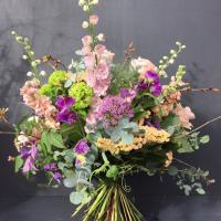 Dansk large mixed lilac and peach handtied bouquet
